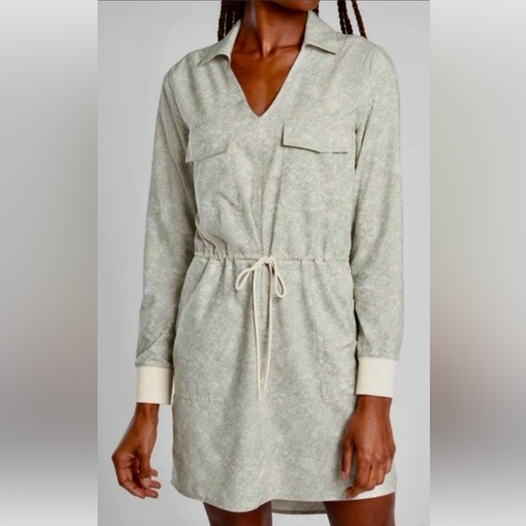 Athena Dresses & Skirts - Athena Light tan Long Sleeve Zuma print dress  (new worn) and adorable Medium